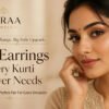Woman wearing statement earrings with a simple cotton kurti