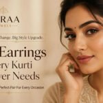 Woman wearing statement earrings with a simple cotton kurti